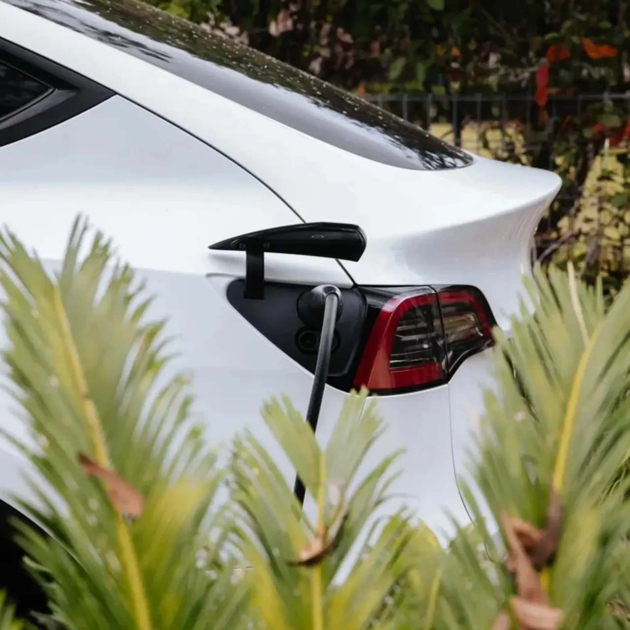 Tesla Electric vehicle being charged at home